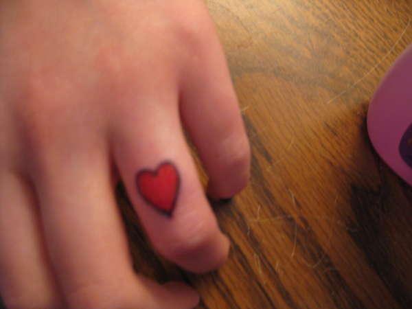 Cute Red Heart Tattoo On Finger