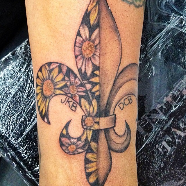 Daisy Fleur De Lis Tattoo On Wrist