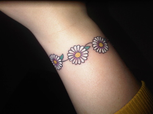 Daisy Flowers Foot Tattoo Idea