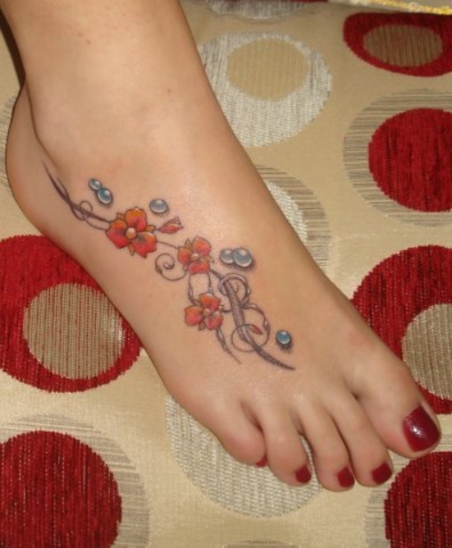 Daisy Tattoo On Girl Right Foot