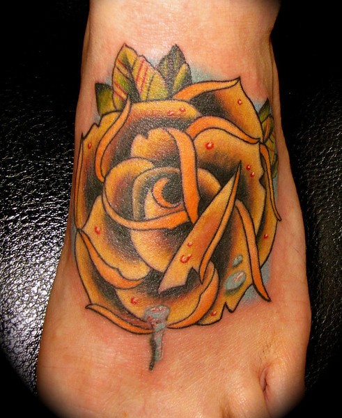 Dew Drops On Yellow Rose Traditional Tattoo On Foot