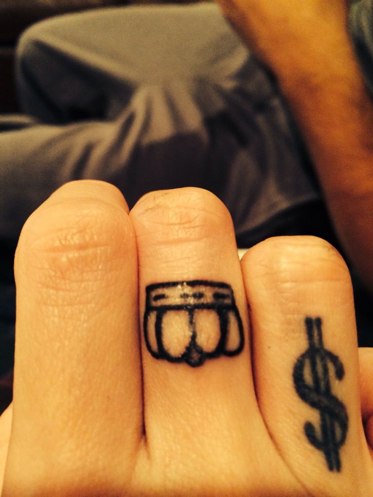 Dollar Sign And Crown Tattoos On Fingers