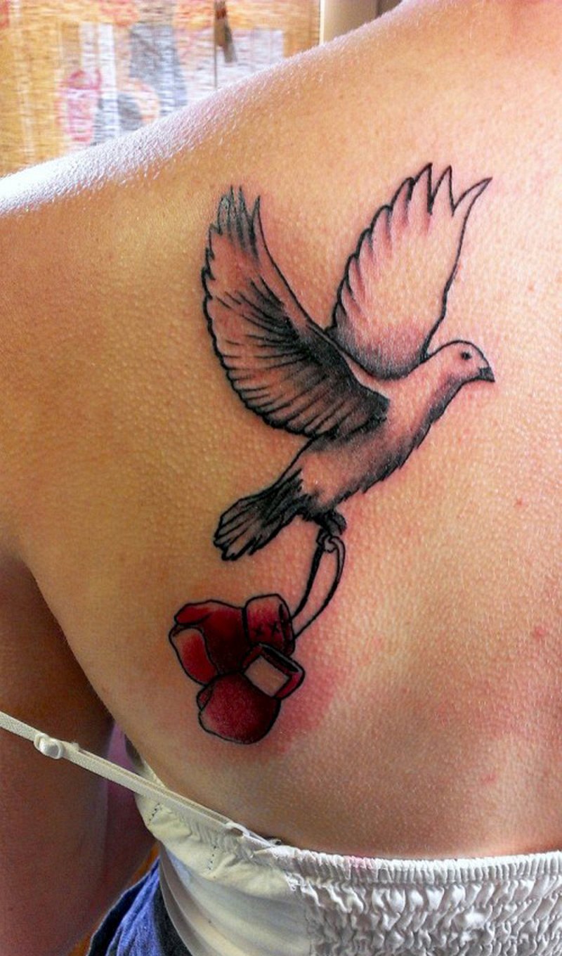 Dove Flying With Boxing Gloves Tattoo On Left Back Shoulder