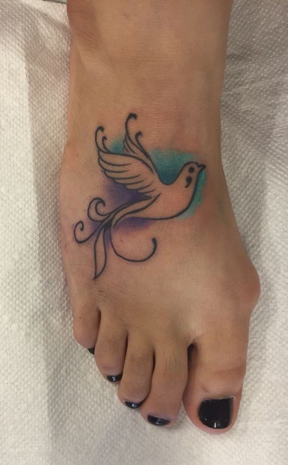 Dove With Semicolon Tattoo On Women Foot