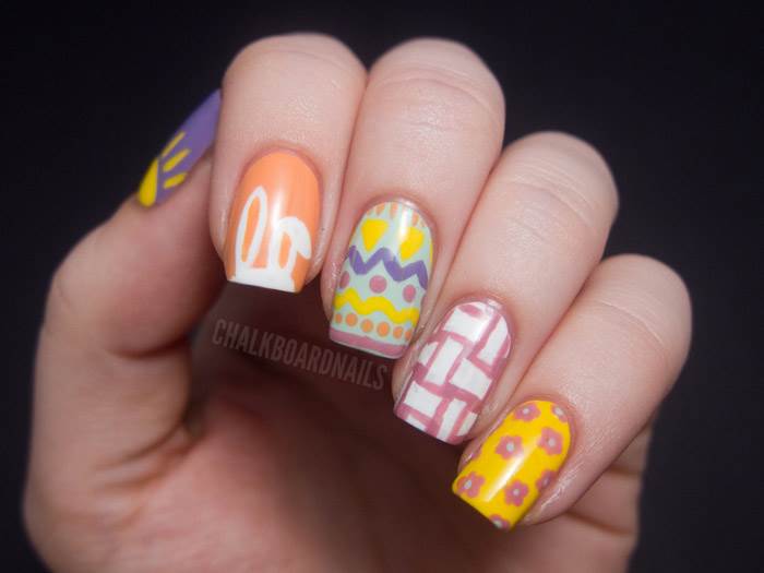 Easter Egg With Bunny Ears And Flowers Nail Art Design