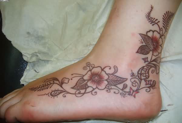 Elegant Flowers Vine Tattoo On Foot