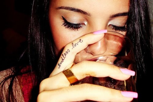 Endless Love Tattoo On Girl Side Finger