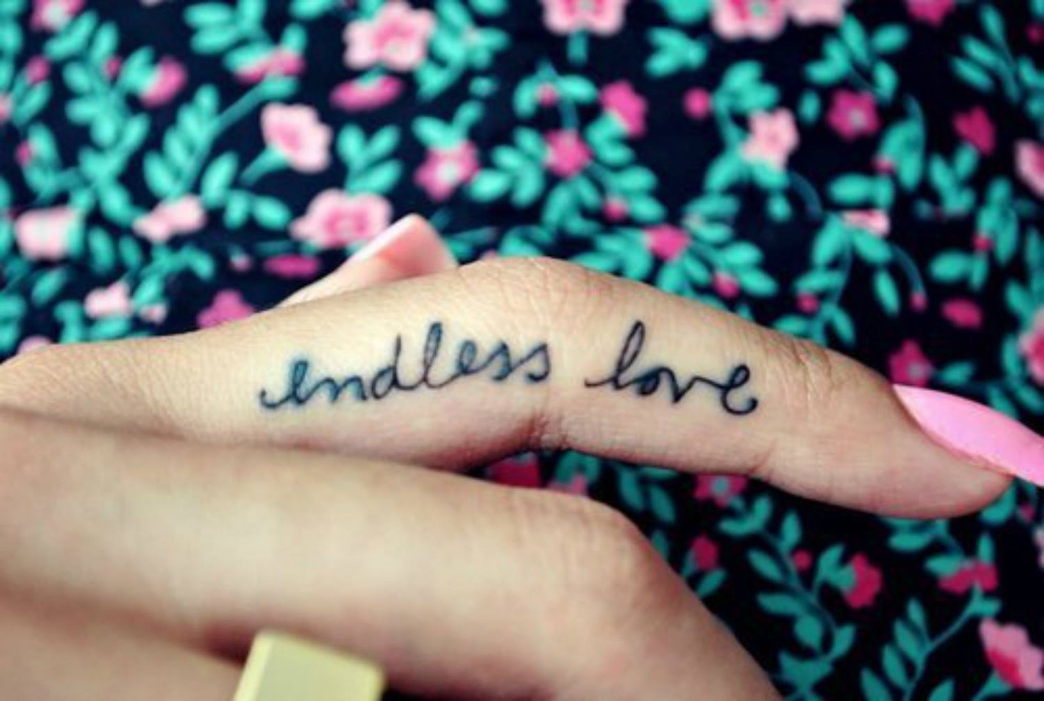 Endless Love Tattoo On Side Finger