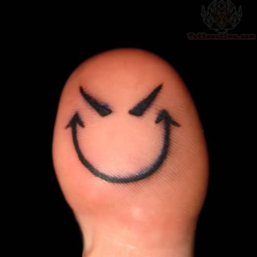 Evil Smiley Bottom Of Toe Tattoo