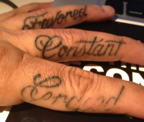 Favored And Constant Side Finger Tattoos