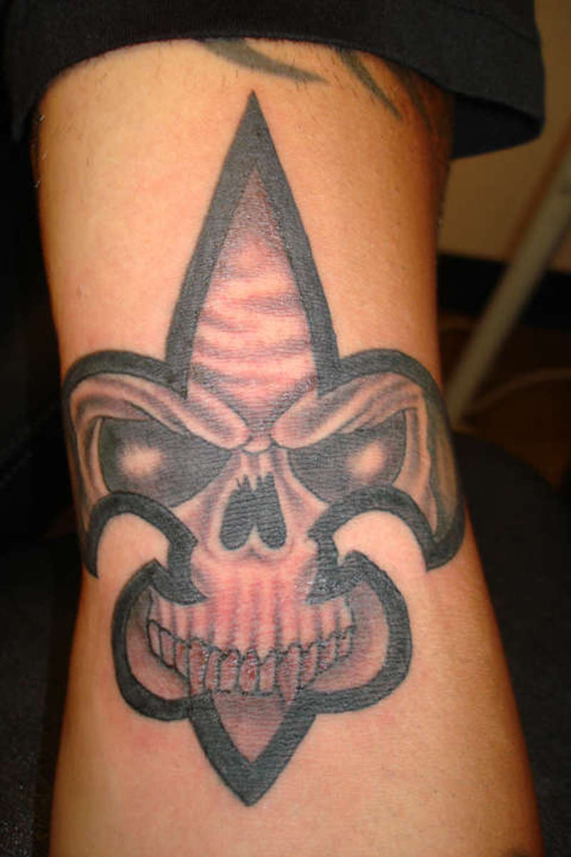 Fleur De Lis Skull Tattoo On Arm
