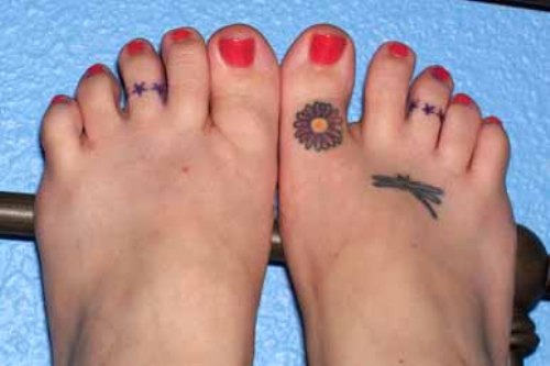 Flower And Stars Toes Tattoo For Girls