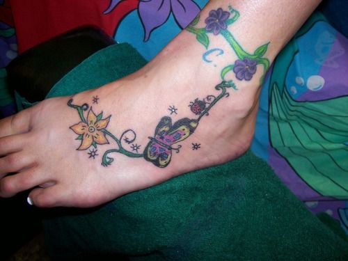 Flower Butterfly And Ladybug Tattoo On Left Foot