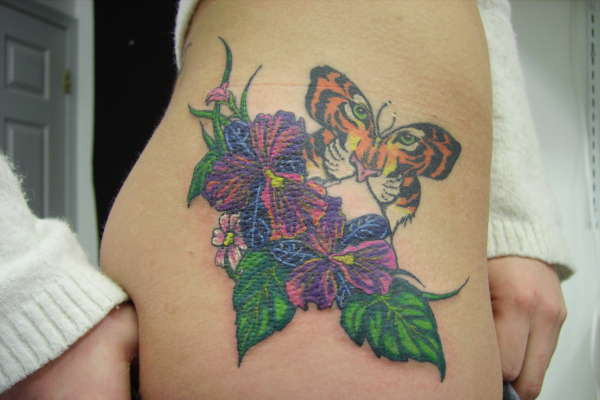 Flowers And Tiger Butterfly Tattoo For Girls