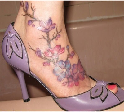 Flowers Tattoo On Women Foot