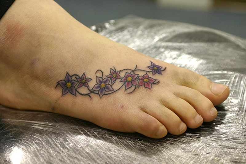 Flowers Traditional Tattoo On Foot