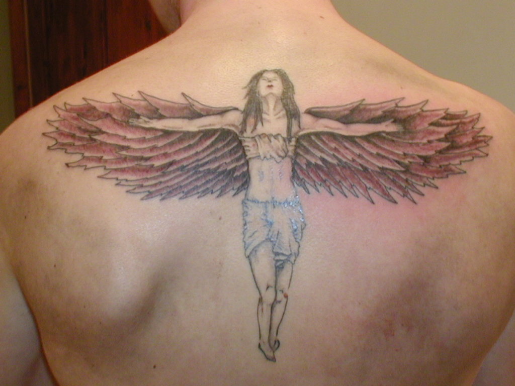 Flying Angel Tattoo On Upper Back