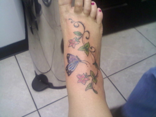 Foot Butterfly With Flowers Tattoo For Girls