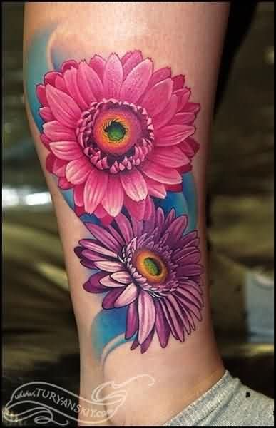 Gerbera Daisy Flowers Tattoos On Leg