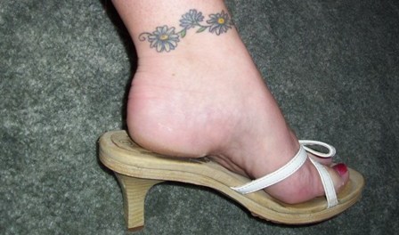 Girl Left Ankle Daisy Flowers Tattoo