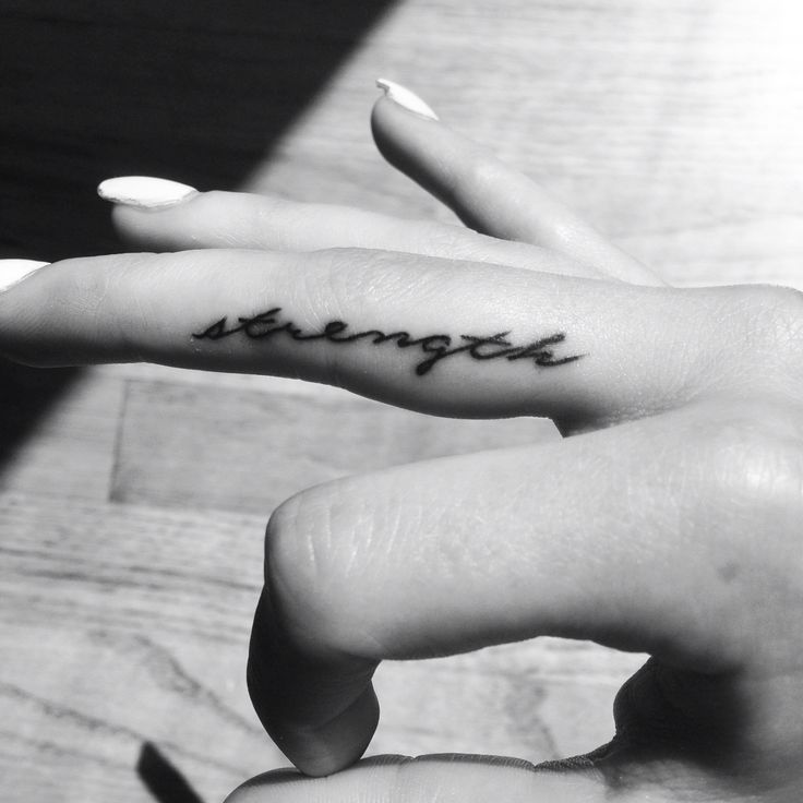 Girly Finger Strength Word Tattoo