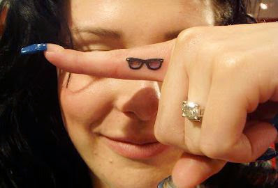 Glasses Tattoo On Girl Side Finger