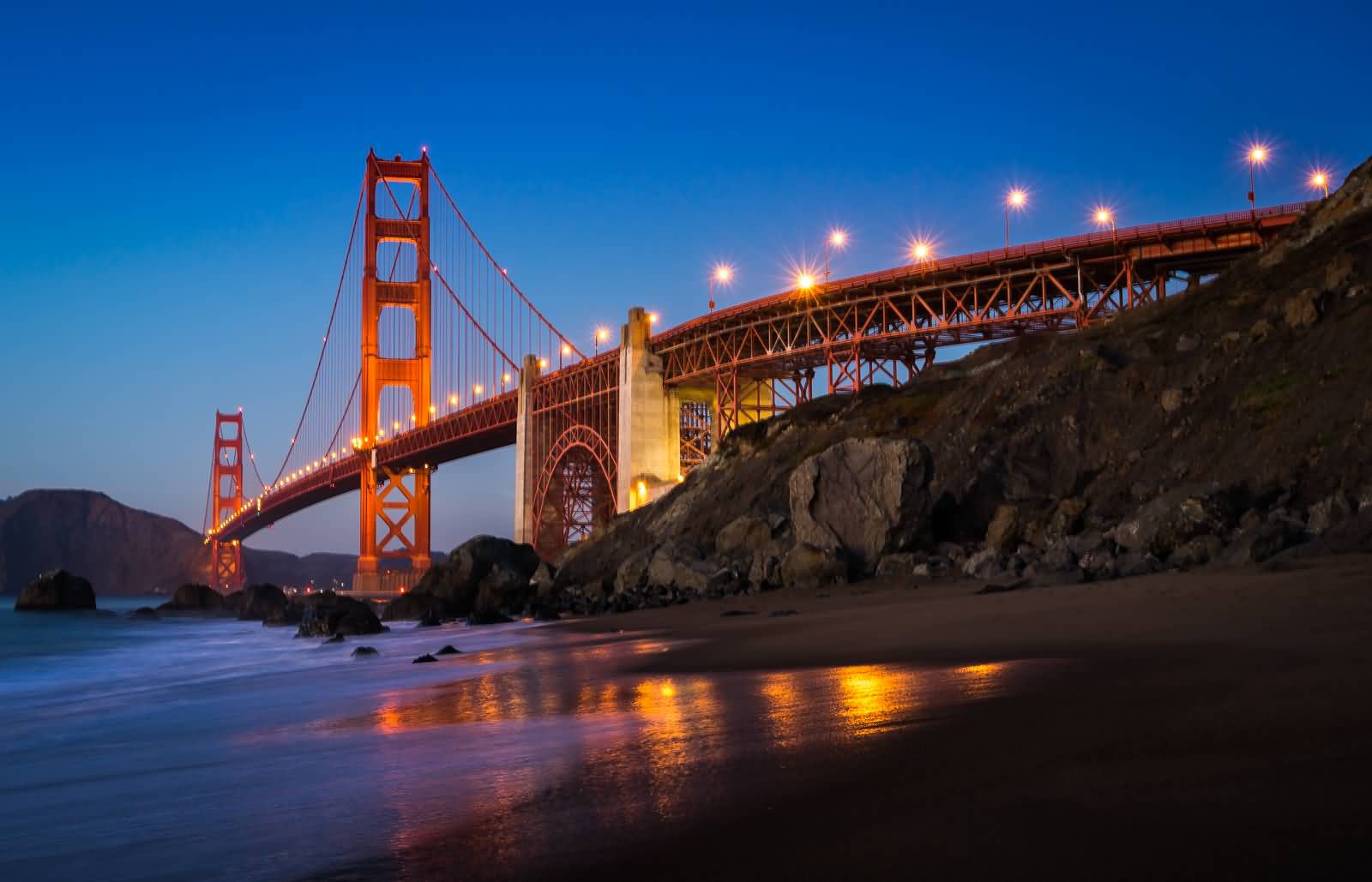 Golden Gate Bridge Lit Up At Night