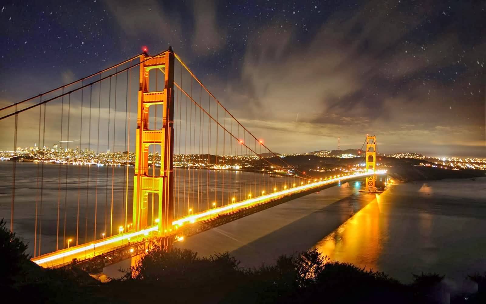 Golden Gate Bridge Lit Up During Night In San Francisco