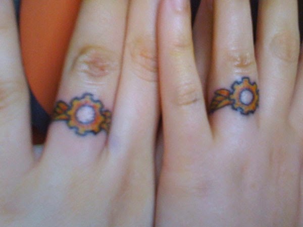Golden Gear Finger Ring Matching Tattoos For Couples