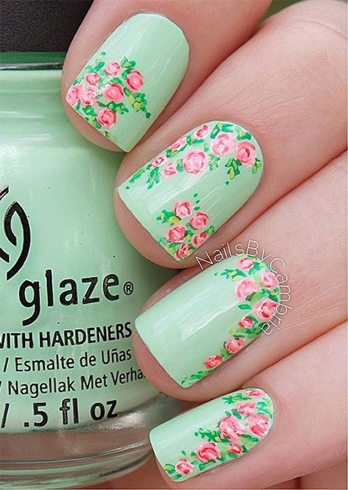 Green Base Nails And Pink Spring Flowers Nail Art