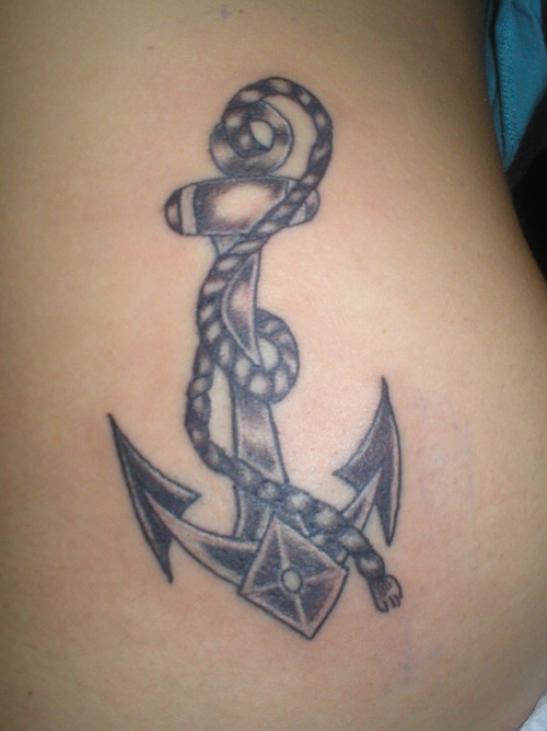 Grey Anchor And Rope Tattoo On Back
