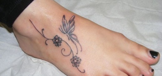 Grey Flowers And Butterfly Tattoo On Foot For Girls