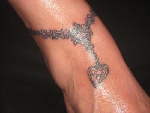 Grey Ink Heart Bracelet Tattoo On Ankle