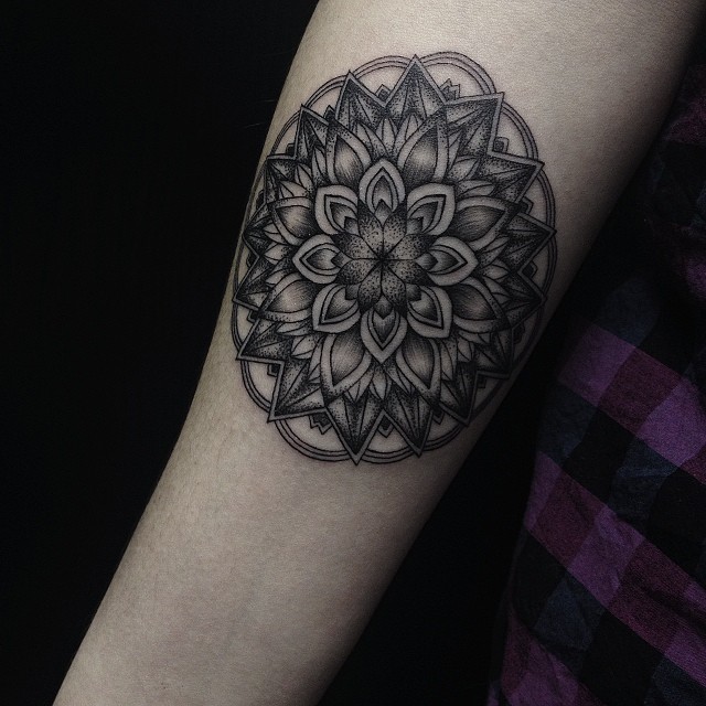 Grey Ink Mandala Tattoo On Forearm