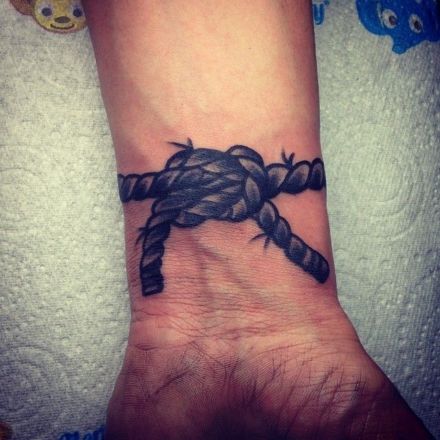 Grey Ink Rope Tattoo On Wrist