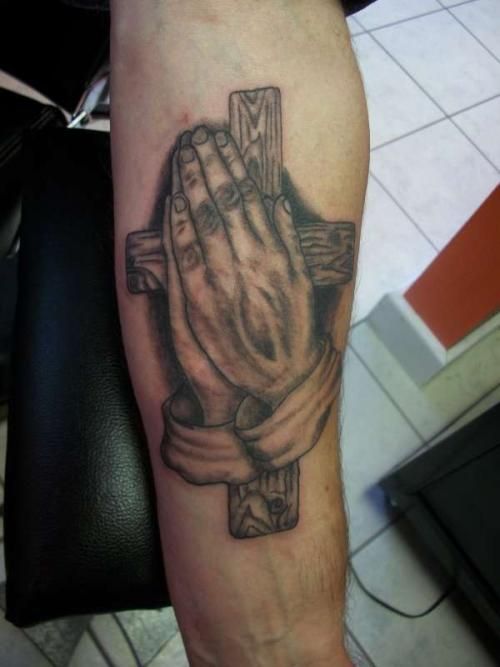 Grey Praying Hands Cross Tattoo On Forearm For Men