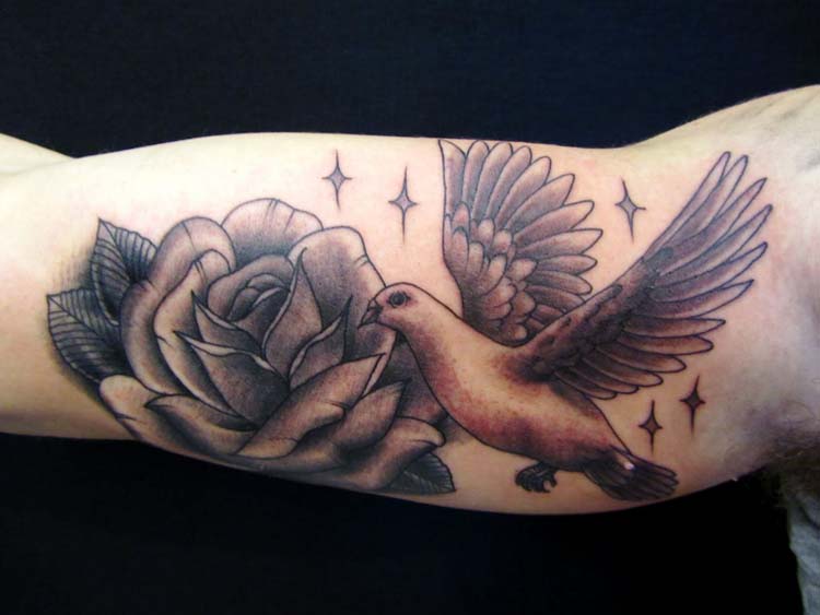 Grey Rose Flower And Dove Tattoo On Bicep