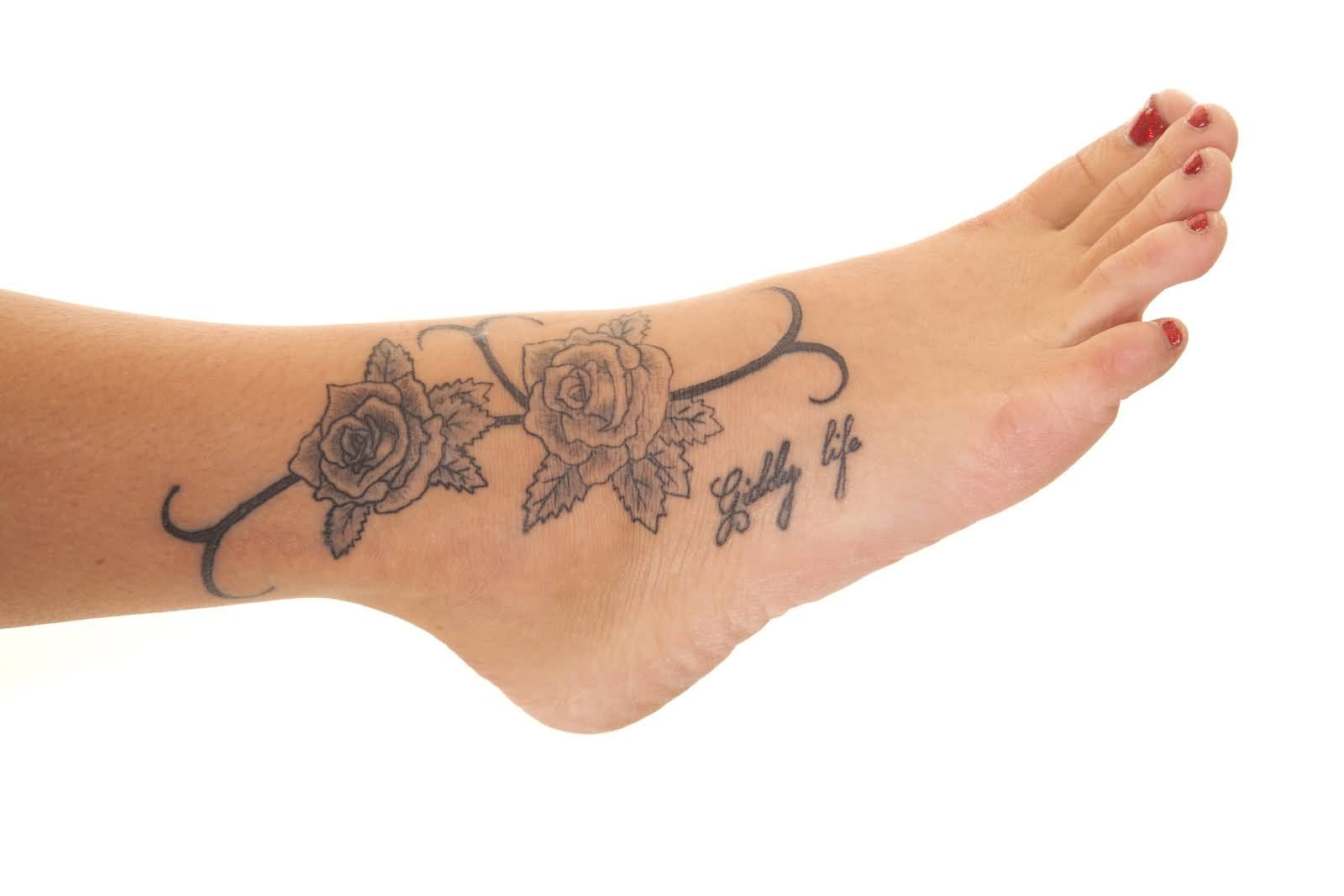 Grey Wording Roses Tattoo On Foot For Girls