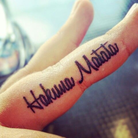 Hakuna Matata Tattoo On Inner Middle Finger