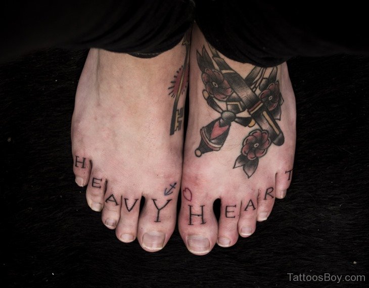 Heavy Heart Words Tattoo On Toes