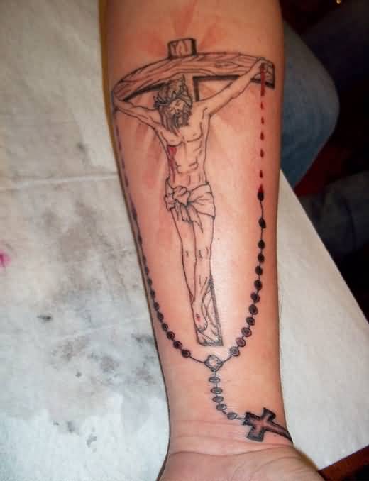 Holy Cross And Rosary Tattoo On Forearm