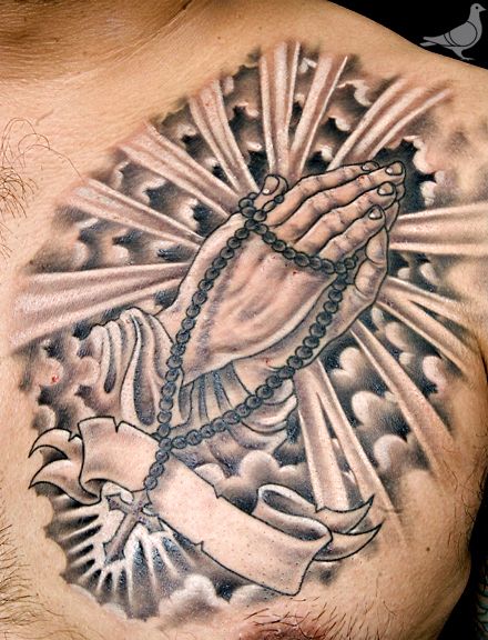 Holy Praying Hands With Rosary Banner Tattoo On Chest