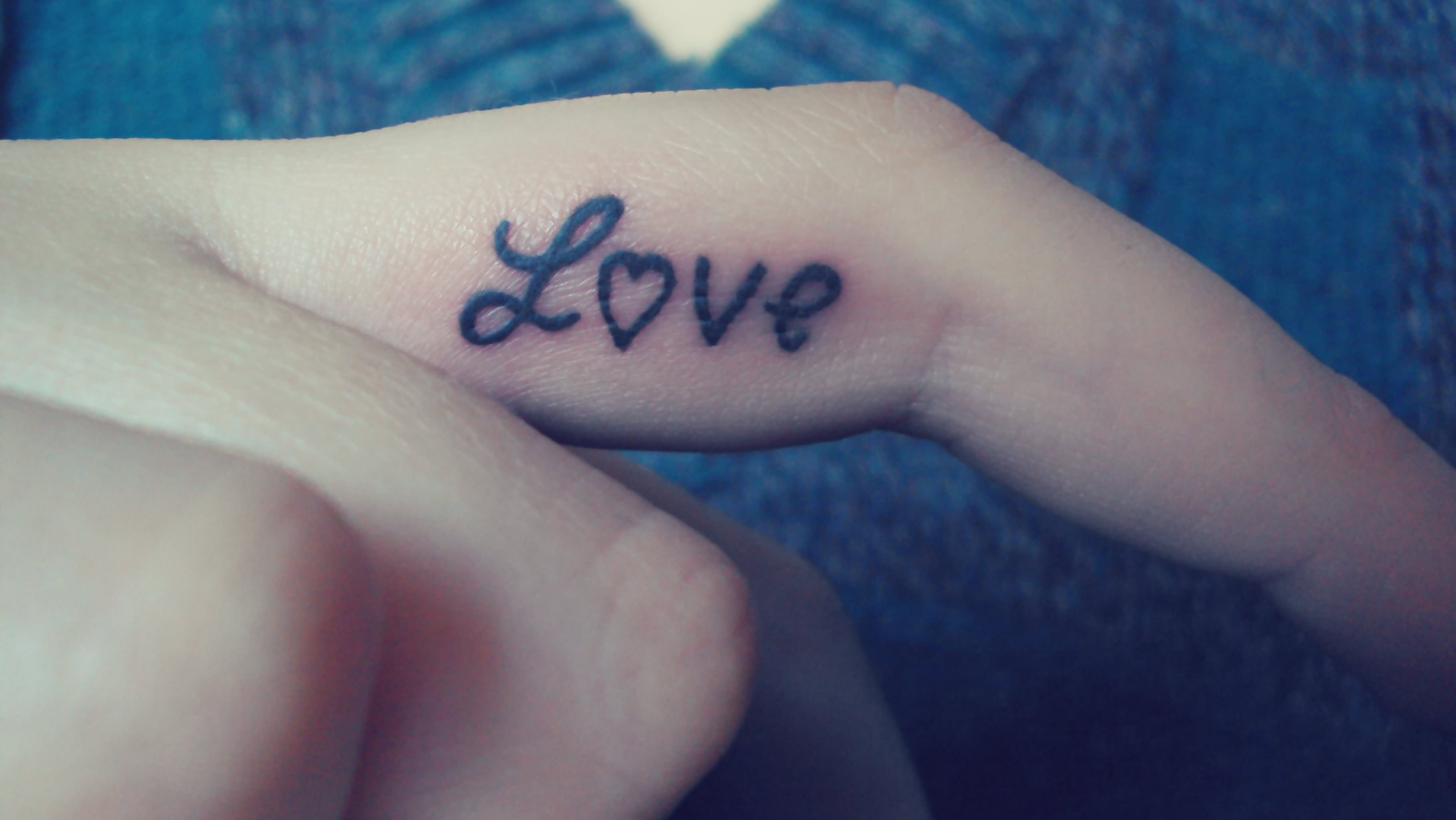 Inner Finger Love Word Tattoo By Coralline