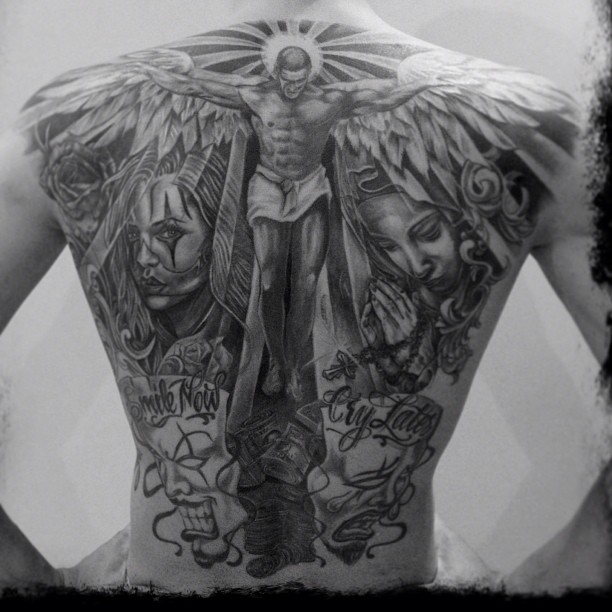 Jester And Angel Tattoo On Full Back