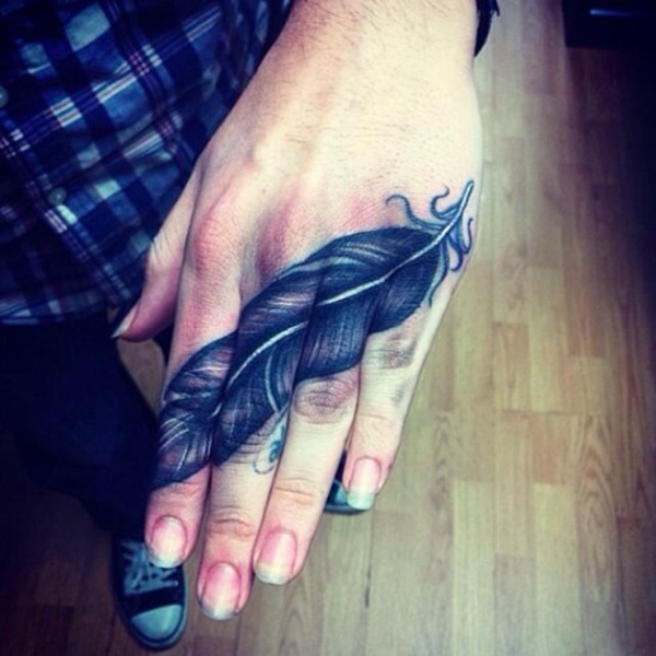 Large Feather Tattoo On Girl Fingers