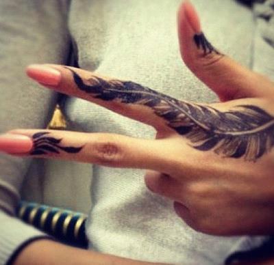 Left Hand Feather Tattoo On Finger