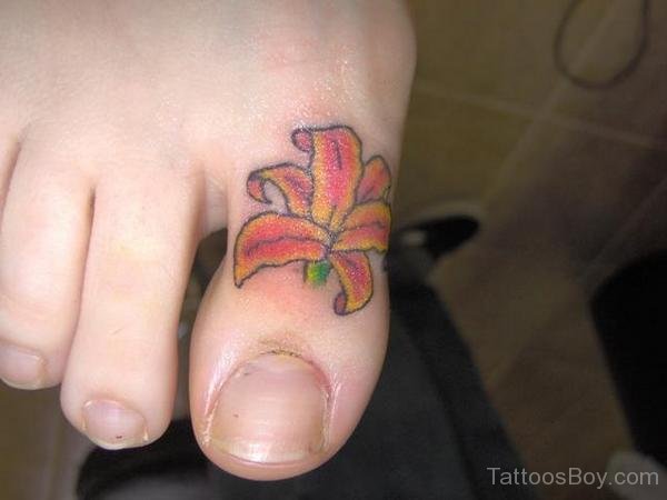 Lily Flower Tattoo On Big Toe