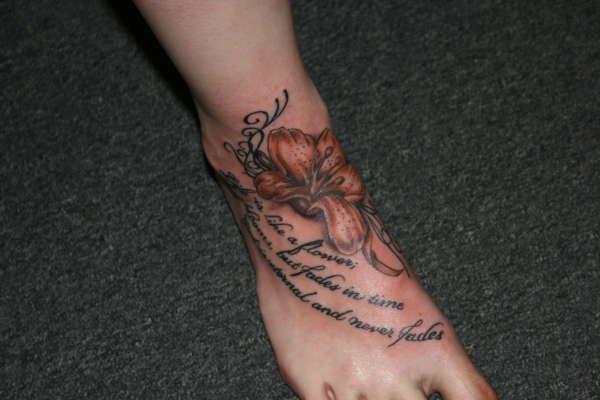 Lily Flower With Message Foot Tattoo