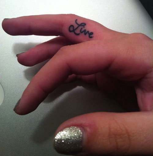 Live Word Tattoo On Girly Finger