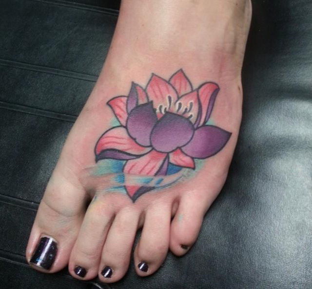 Lotus Flower Traditional Tattoo On Foot For Women